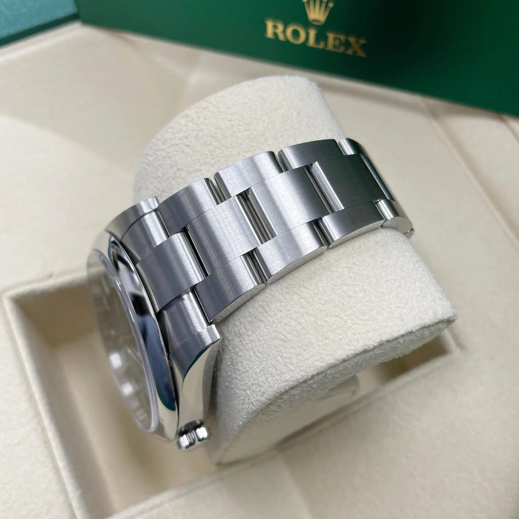 Rolex Oyster Perpetual 41mm 124300-0005 Green Index Dial & Smooth Bezel Oyster Bracelet Men’s Watch